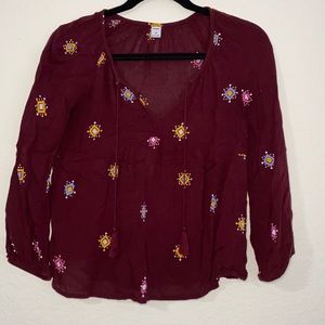 Burgundy printed Old Navy tassel top. Size XS.